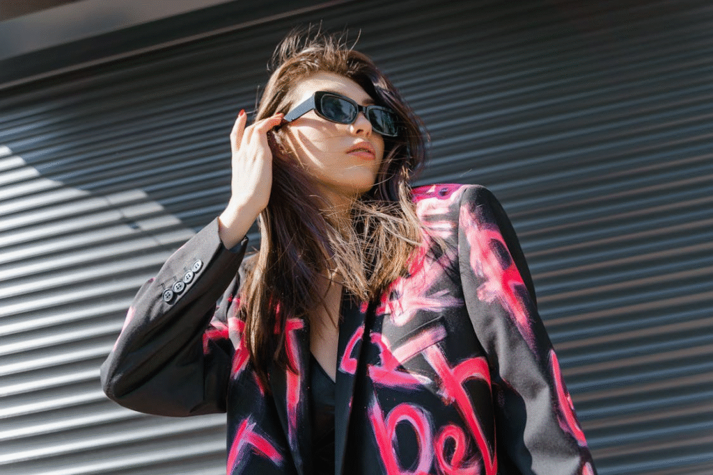 woman in bespoke blazer. image