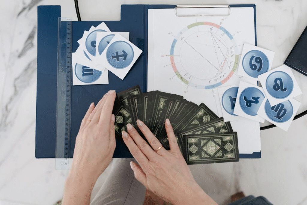 Woman Spreading Cards for a Tarot Reading
