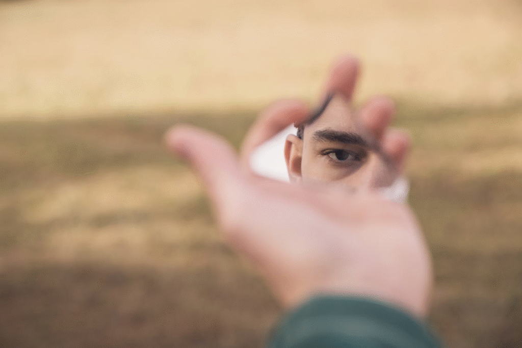 Reflective Eye in Broken Mirror Outdoors
