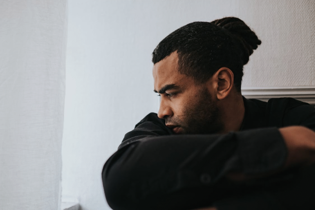 Man Sitting and Looking Sad