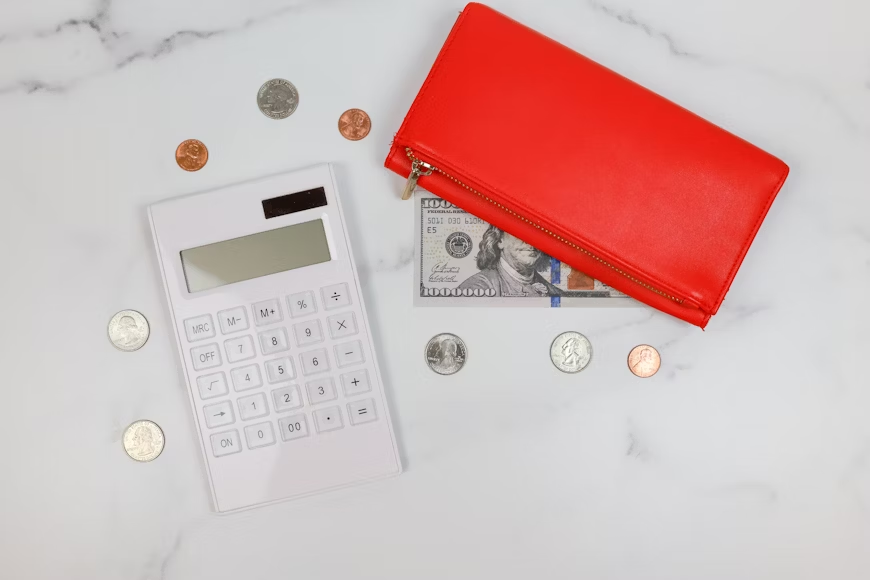 image of a calculator and money