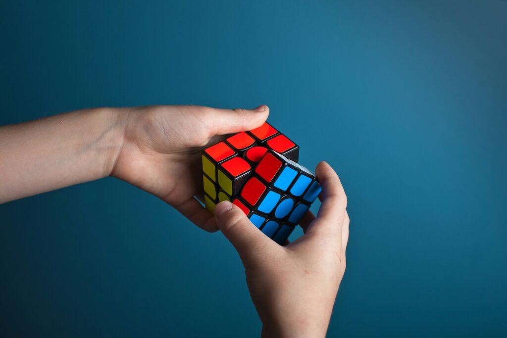 person playing magic cube
