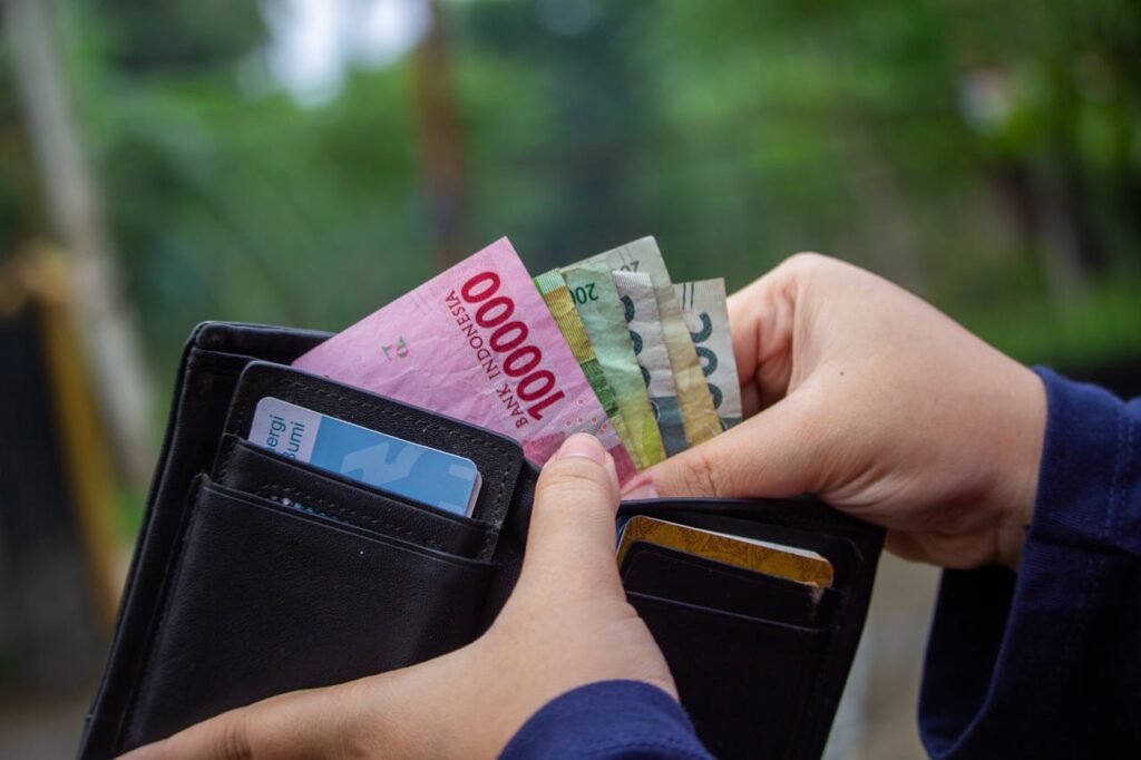 Person Holding a Money