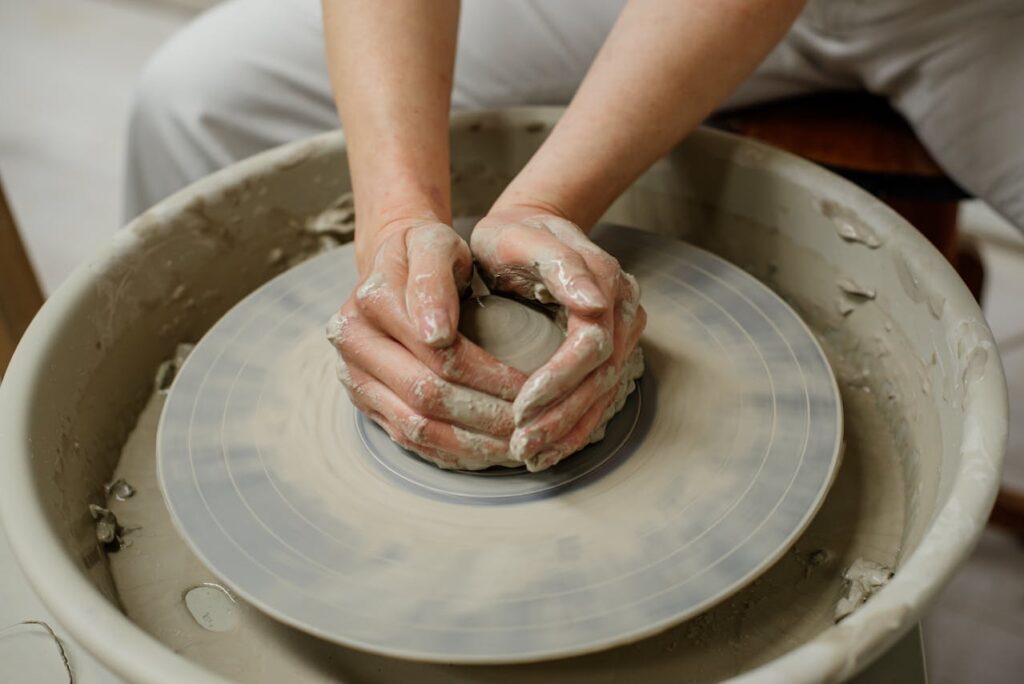 Woman Hands Making Clay Pot
