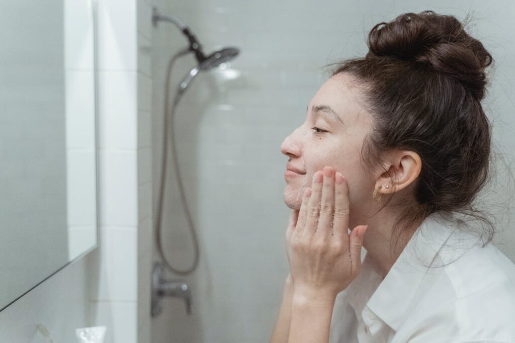 Woman Washing and Massaging Her Face