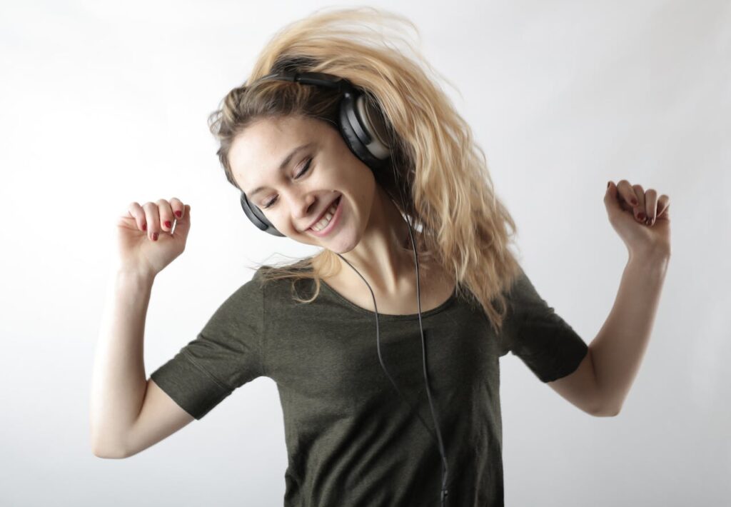 Woman Wearing Black Headphones