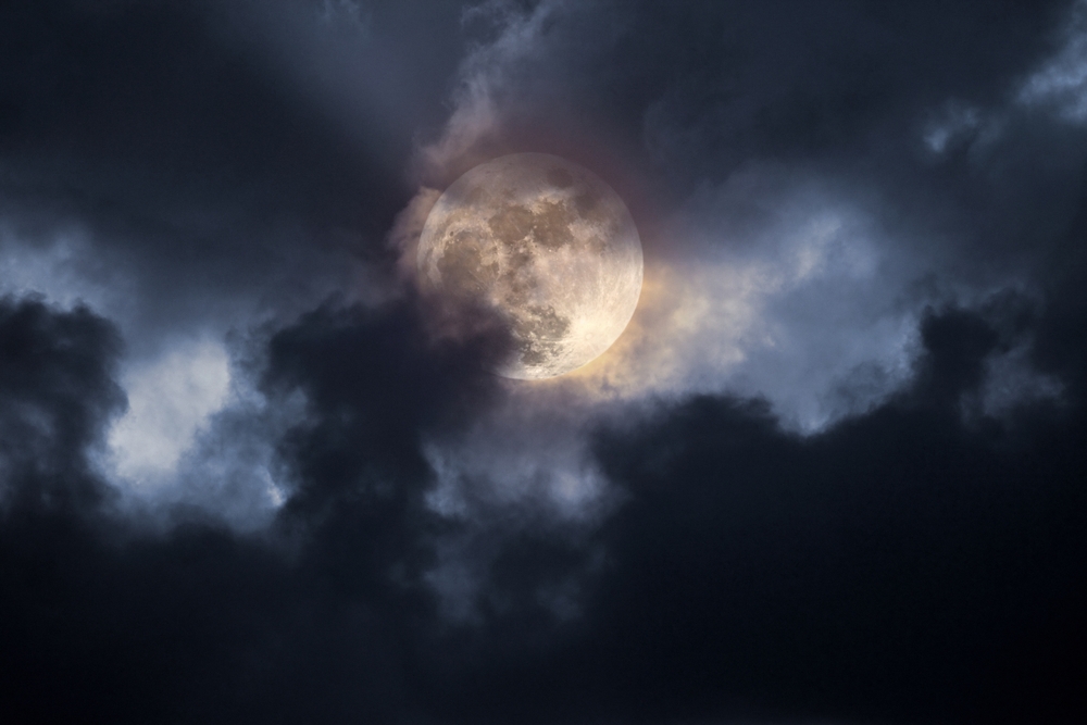 Illustration of an interesting full moon in a cloudy night
