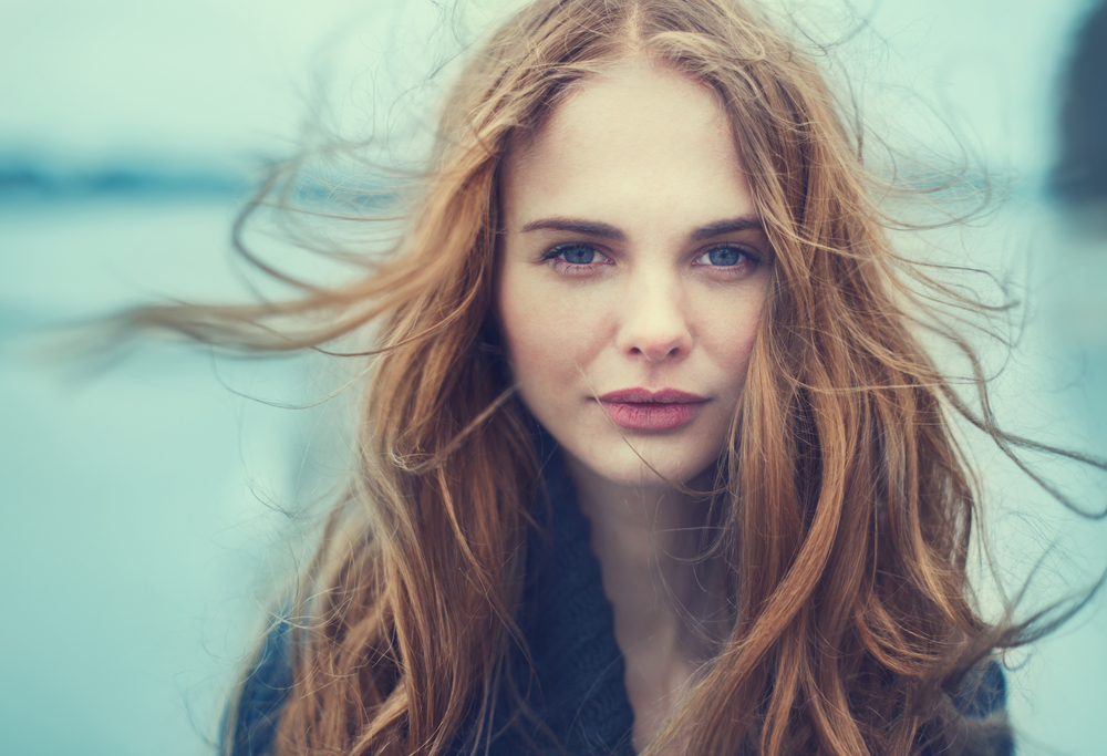 portrait of a beautiful girl on a cold windy day