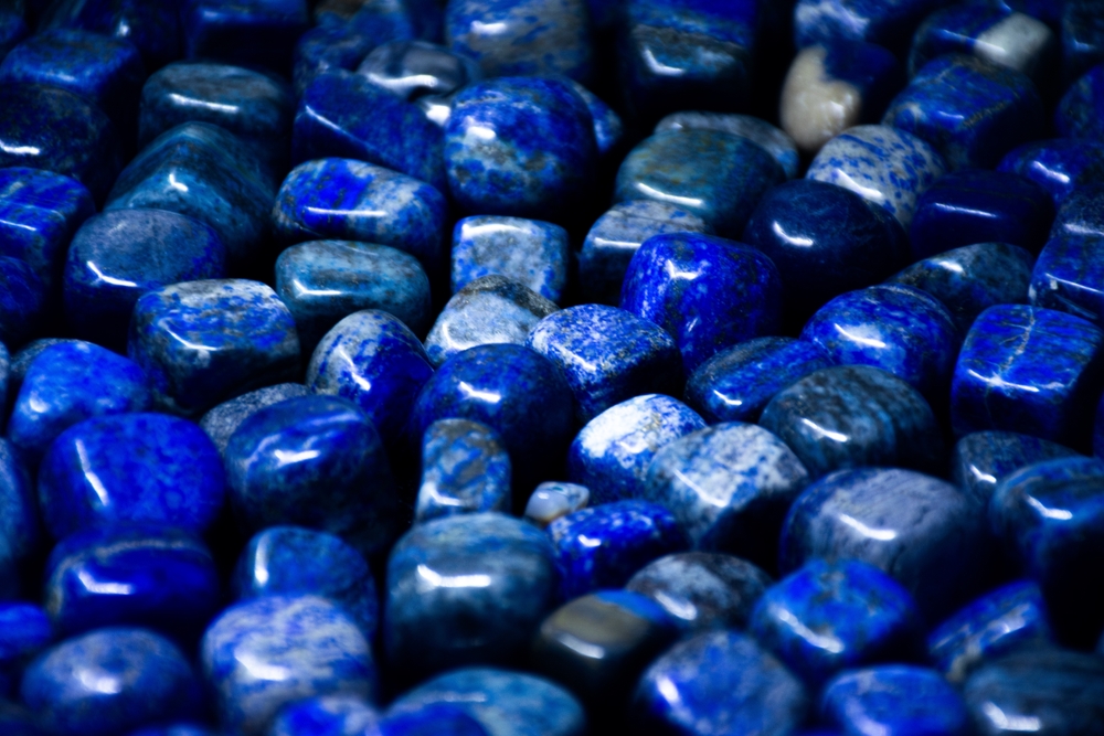 Lapis Lazuli Tumbled Stones isolated on black background