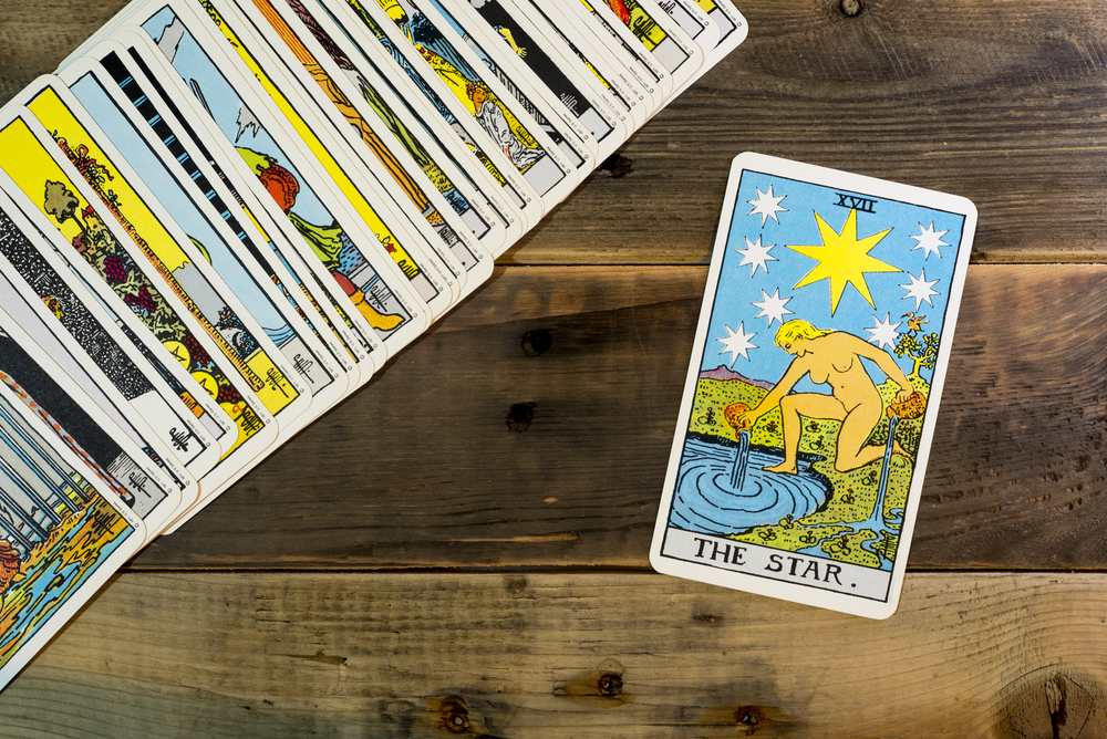 Chainat Province, Thailand, September 16, 2017. illustrative editorial tarot cards "THE STAR" tarot cards on the table.