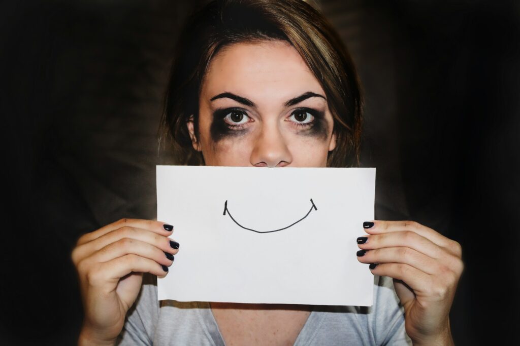 person holding white printer paper
