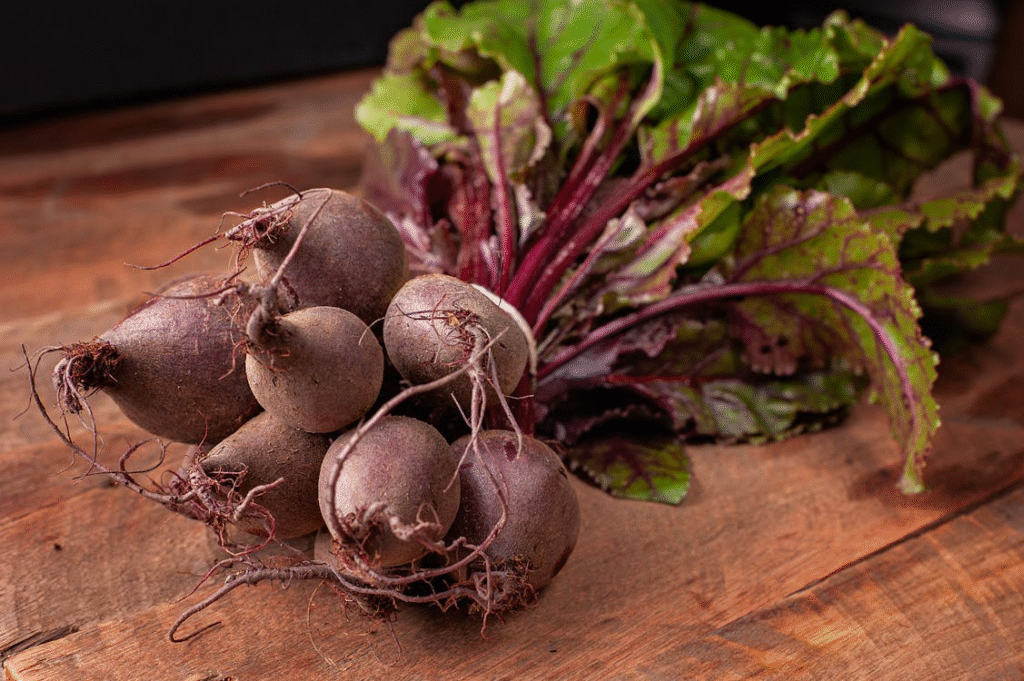 Fresh Organic Beetroots on Wooden Surface