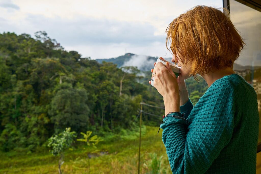 Woman Drinking Mug of Coffee
