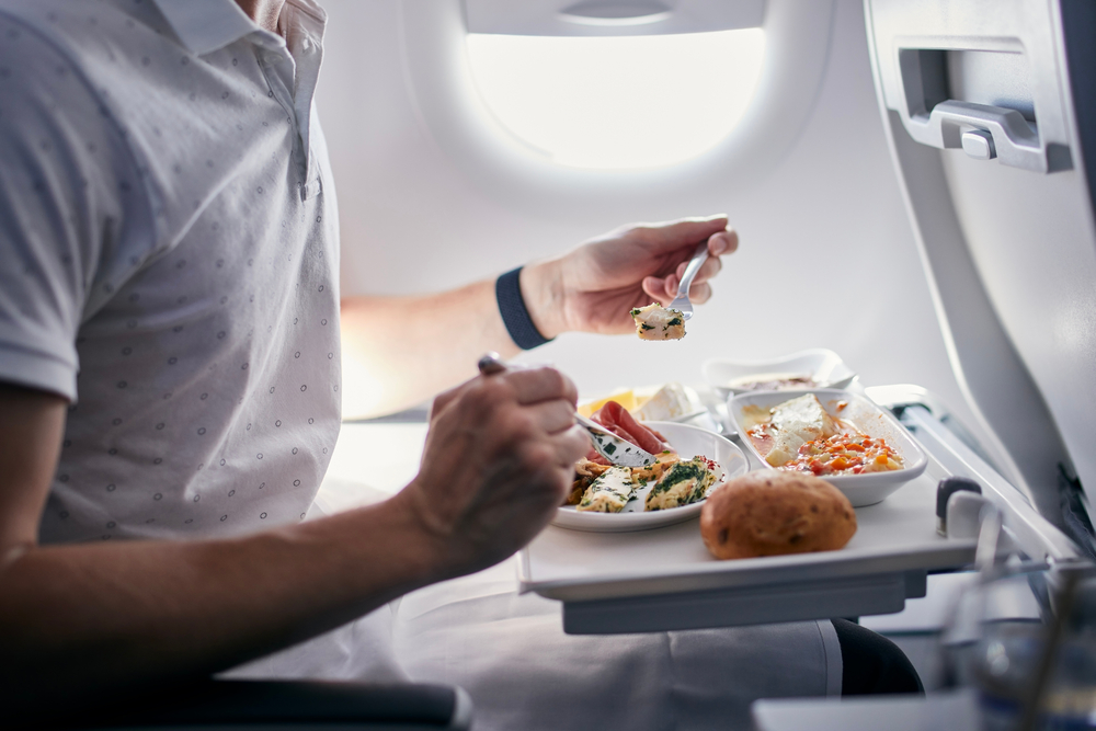 Here’s What You Should Never Order on a Flight, According to Flight Attendants