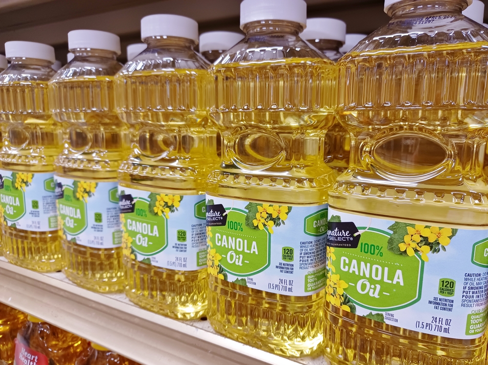 Houston, Texas USA 06-02-2024: Canola Oil supermarket shelf Signature Select brand name.