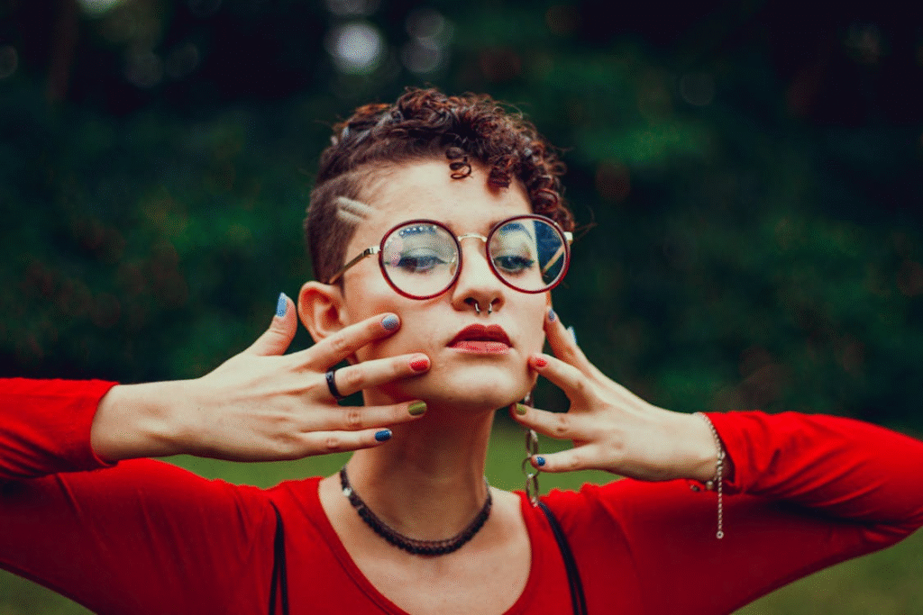 Woman in Red Top Wearing Eyeglasses
