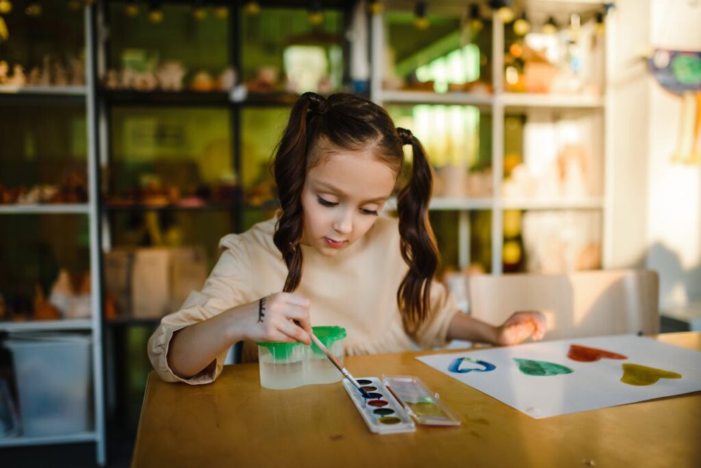 Girl Painting on a paper
