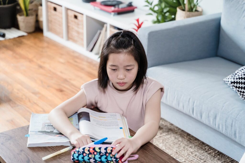 A Girl Studying at Home