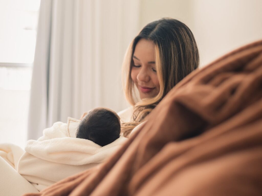 Tender Mother and Baby Bonding Indoors
