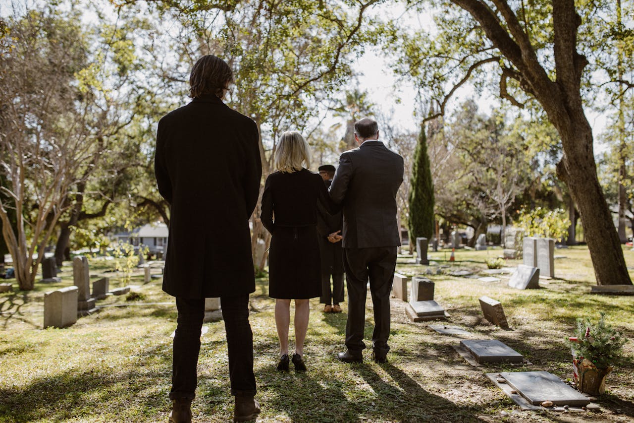 Photo of People standing on Graveyard
