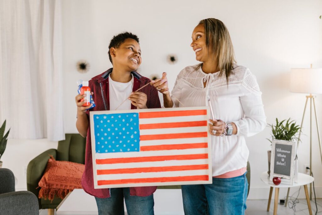 Mother and kid holding Flag