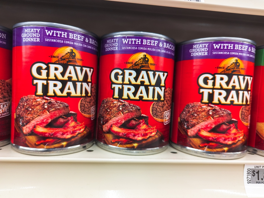 Apex, North Carolina - September 24 2025: Gravy Train Cans on Shelf Pet Dog Food Wet