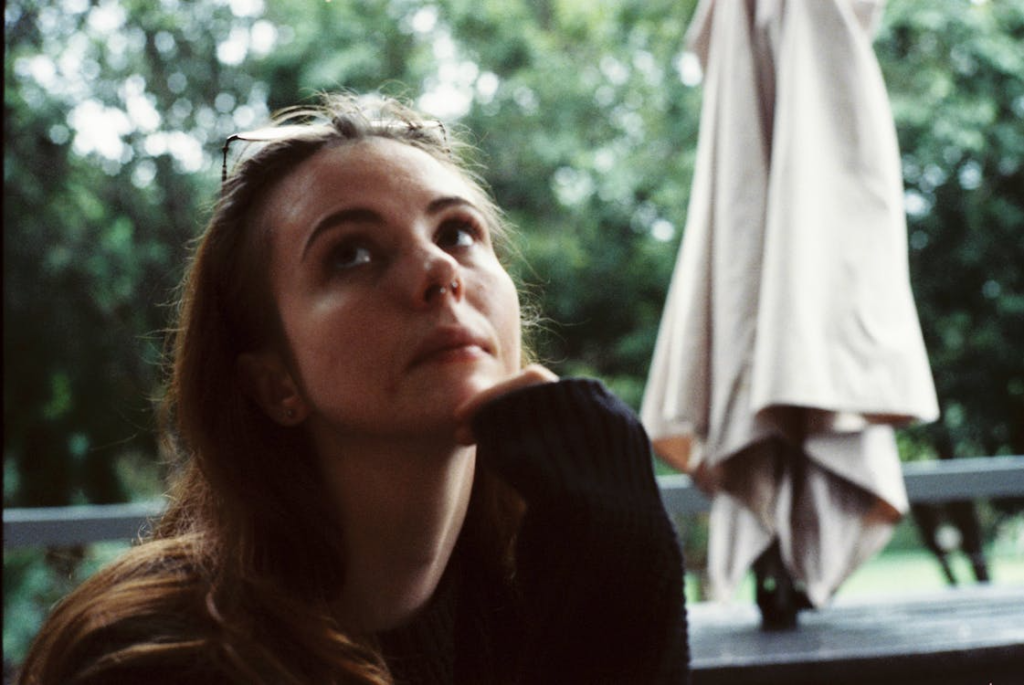 Thoughtful Woman Outdoors in Contemplative Mood