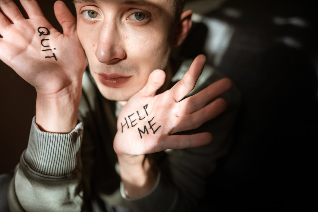 person with writing on their hands