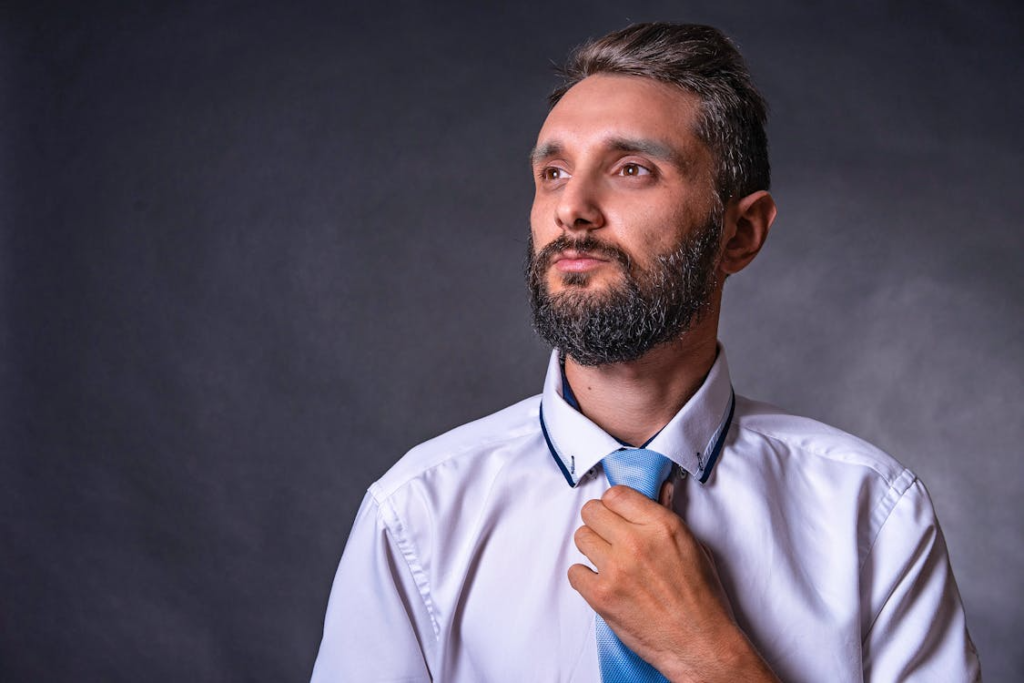 Bearded Man Wearing Blue Necktie