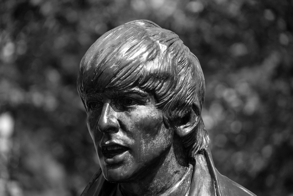 LIVERPOOL UNITED KINGDOM 06 07 23 Statue of George Harrison on Waterfront in 2015. Donated by the famous Cavern Club, the placement of the statue coincides with the 50 year anniversary band