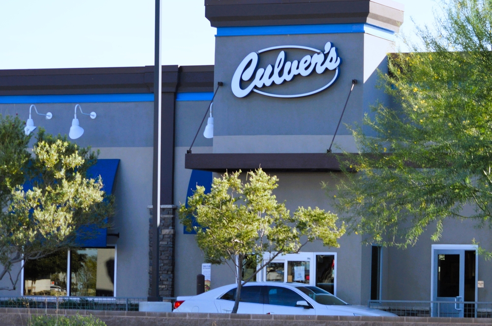 Maricopa, Arizona - Jan. 17 2024: Culver's is a family-favorite restaurant known for their local ButterBurgers, Fresh Frozen Custard and Wisconsin Cheese Curds. Customer in car at drive thru window.