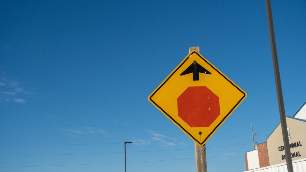 Brooks, Alberta - October 5, 2025: traffic sign, STOP sign ahead