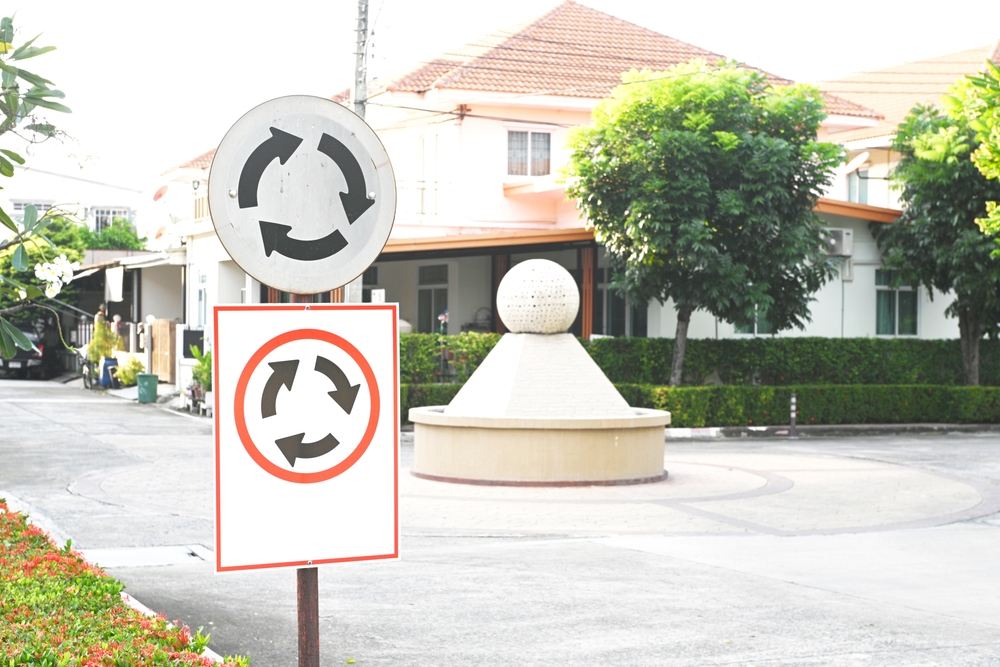 Close-up of roundabout Warning Road Sign.