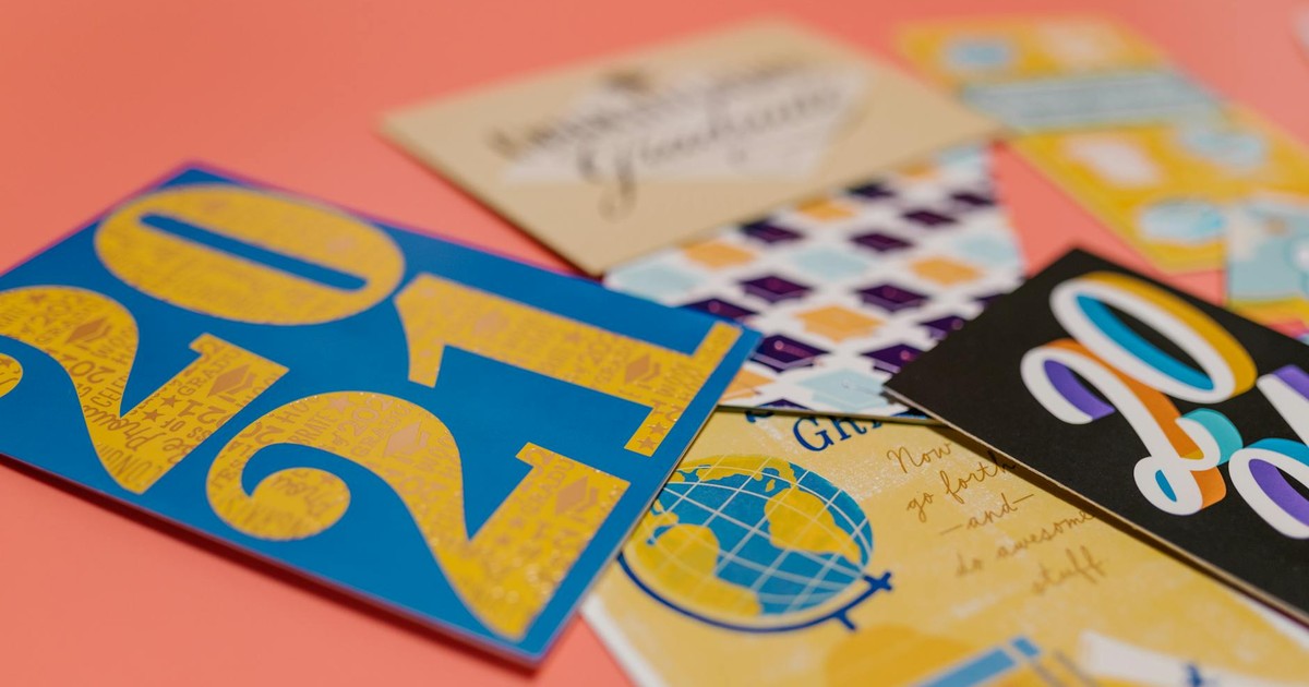 Colorful greeting cards with 2021 design on a peach background.