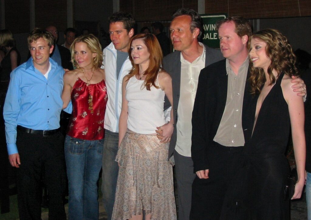 Buffy the Vampire Slayer cast at the wrap party. Tom Lenk, Emma Caulfield, Alexis Denisof, Alyson Hannigan, Anthony Stewart Head, Joss Whedon, Michelle Trachtenberg.