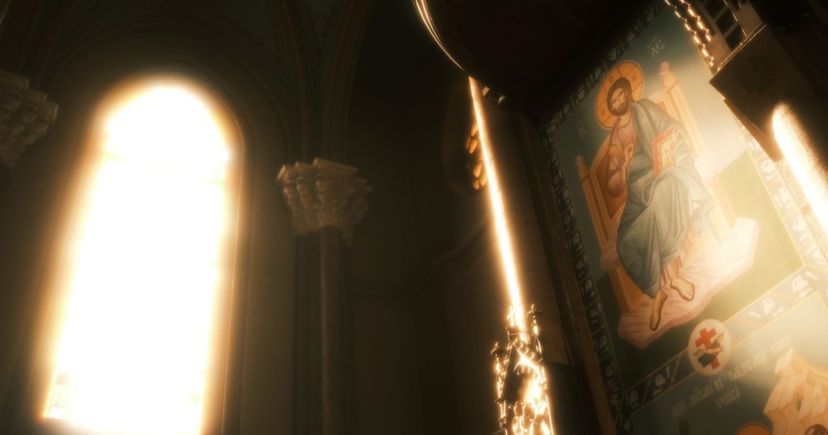 A sunlit church interior highlighting religious art and iconography.