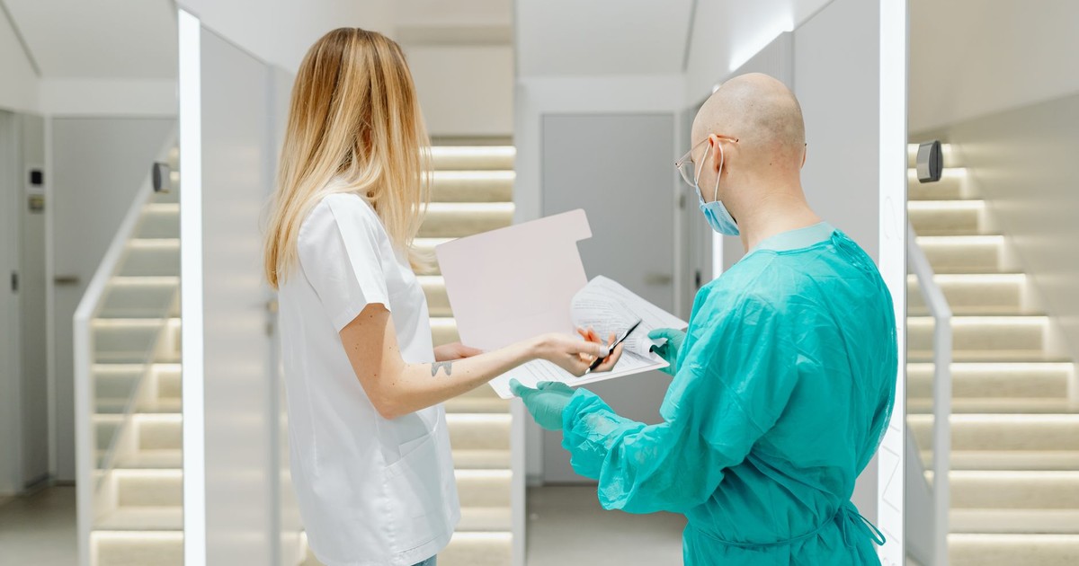 Doctors collaborating in a bright clinic, highlighting teamwork and healthcare.