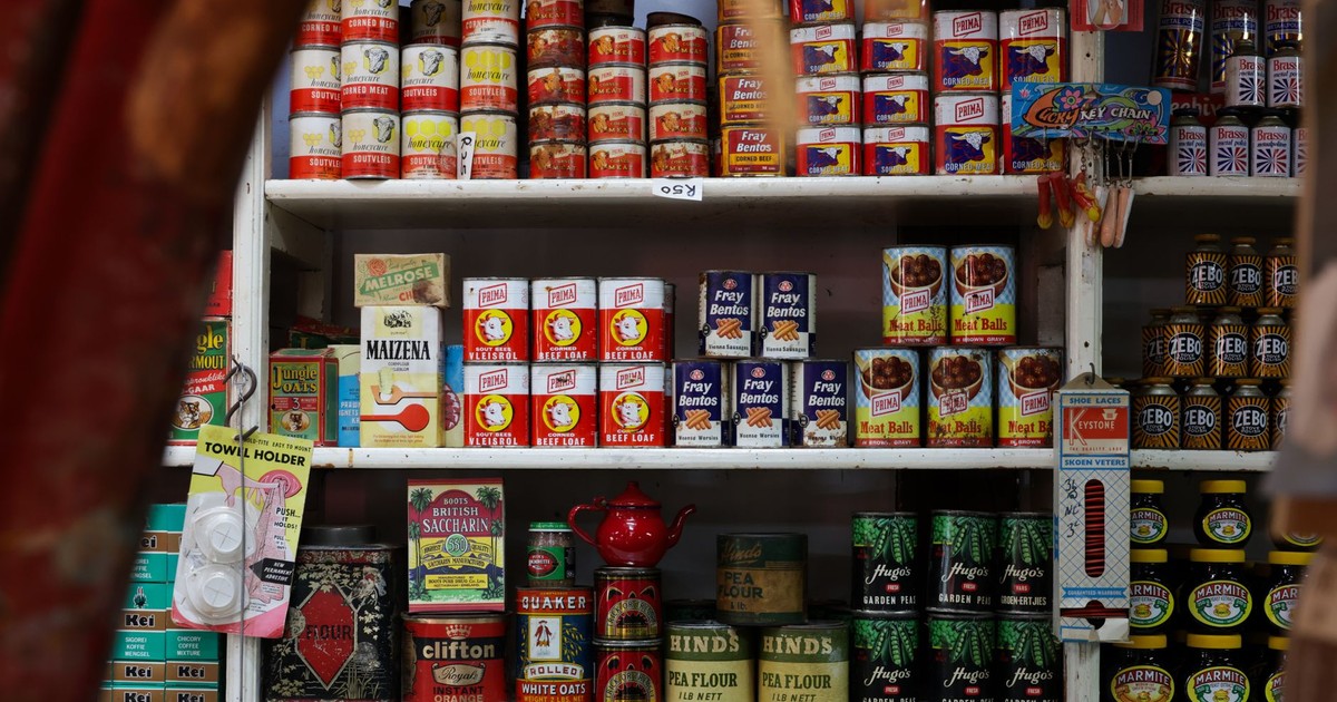 Explore classic canned goods on vintage grocery store shelves, showcasing nostalgic packaging and colors.