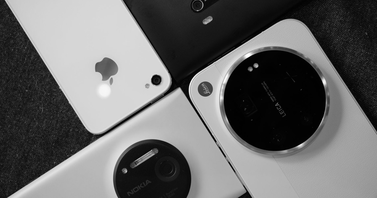 A collection of smartphone cameras artistically arranged in a black and white composition.