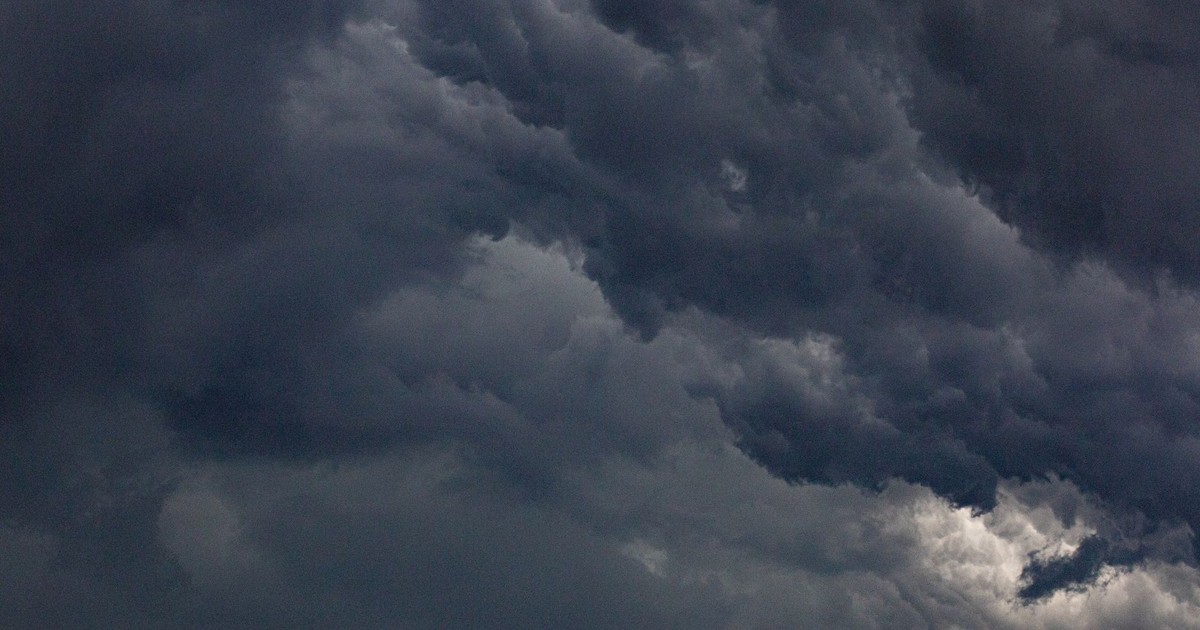 Moody sky filled with dense, dark clouds representing a dramatic atmosphere.