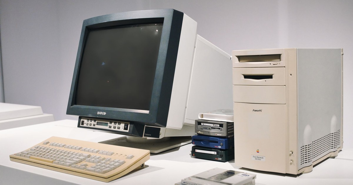A retro computer setup featuring a classic CRT monitor and vintage CPU, showcasing technology history.