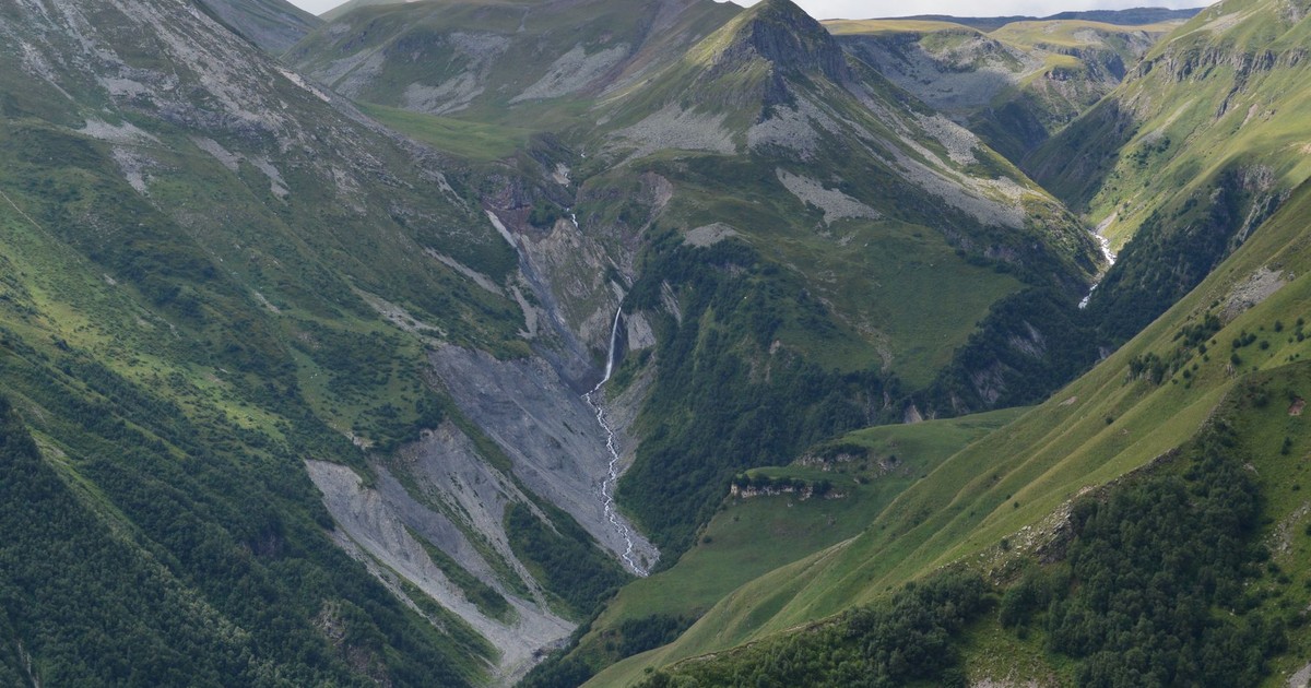 A mesmerizing aerial photograph of a lush mountain valley in Tbilisi, Georgia.