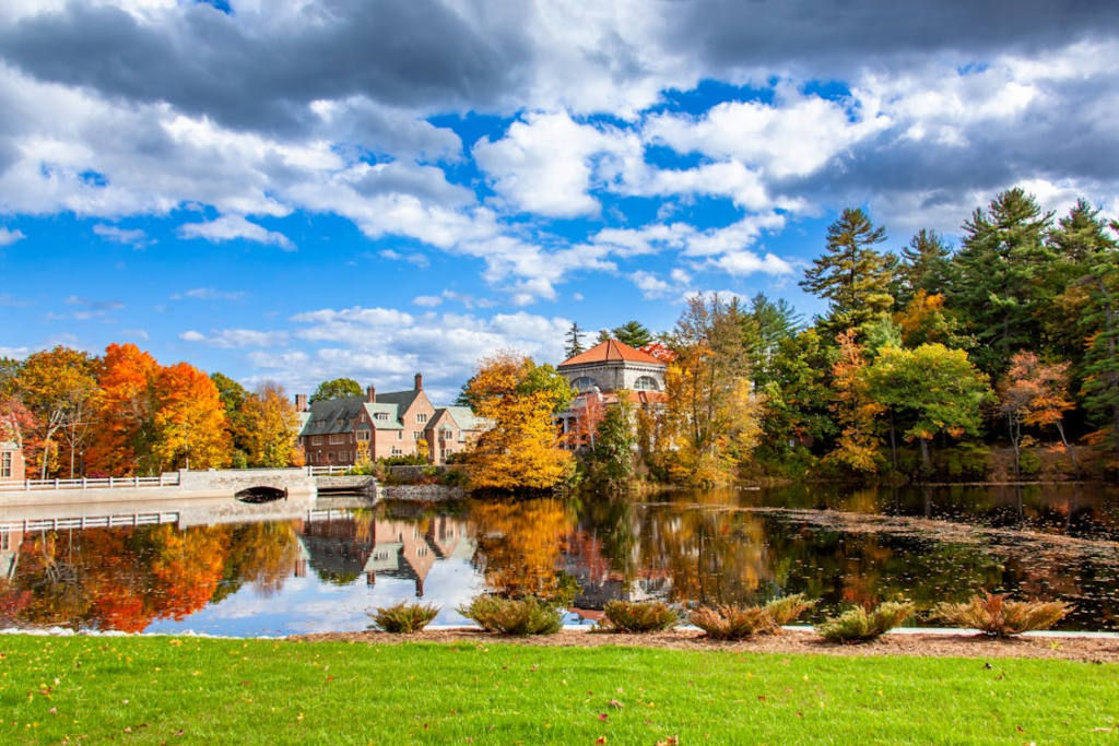 Picturesque autumn landscape featuring vibrant foliage and calm waters in Concord, NH
