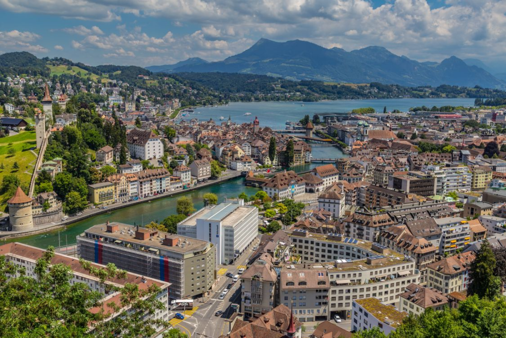 Stunning aerial view of Lucerne, showcasing its unique architecture along the lake and mountains
