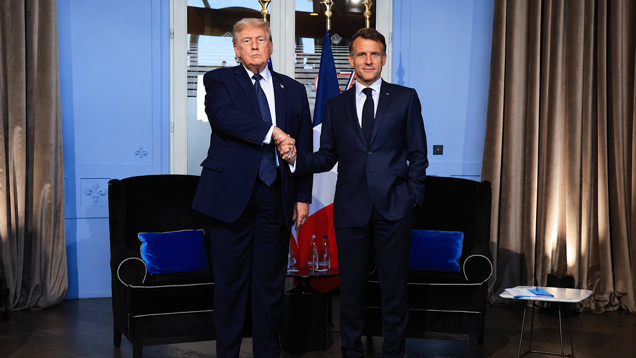 Trump Just Did The Strange Handshake Thing (Twice) With the Macrons at G7