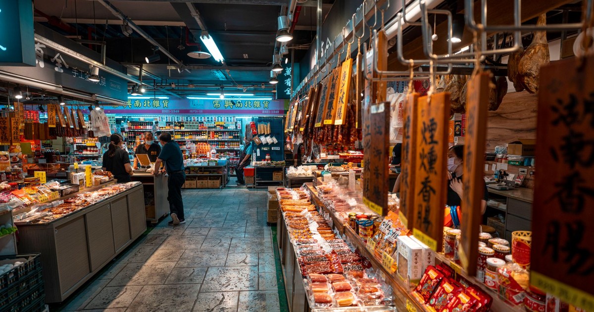 Captivating view of an Asian grocery store interior with diverse food selections.