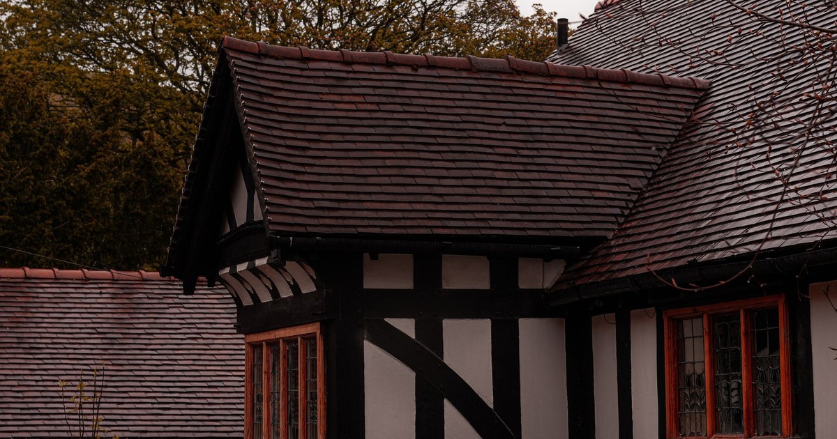 Beautiful view of a Tudor-style house with classic timber framing in Church Stretton, England.