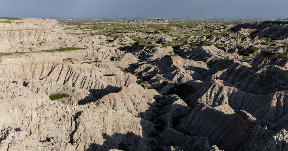Aerial view of Badlands National Park showcasing rugged terrain and natural formations.