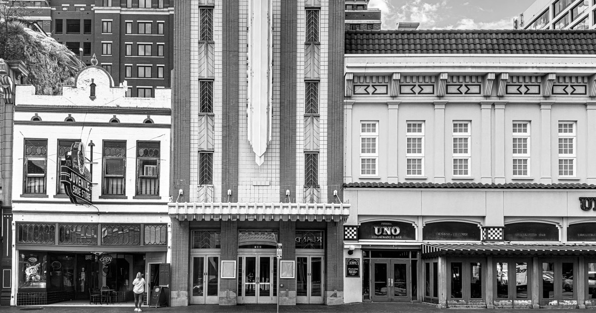 Classic architecture of historic urban buildings in black and white.