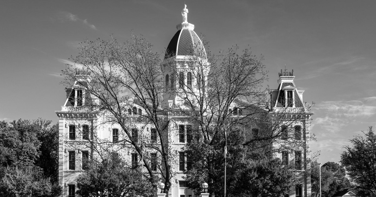 Black and white photo of the iconic Presidio County Courthouse in Marfa, Texas.